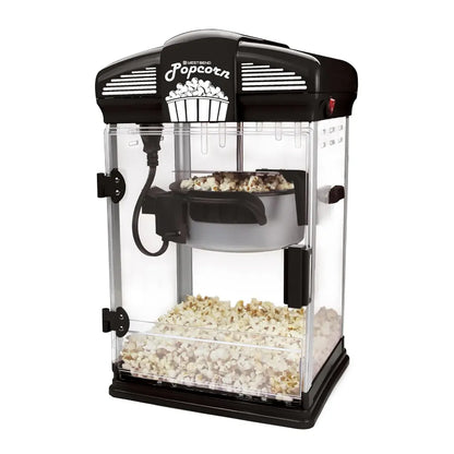 Black popcorn popper machine  with popped popcorn inside.