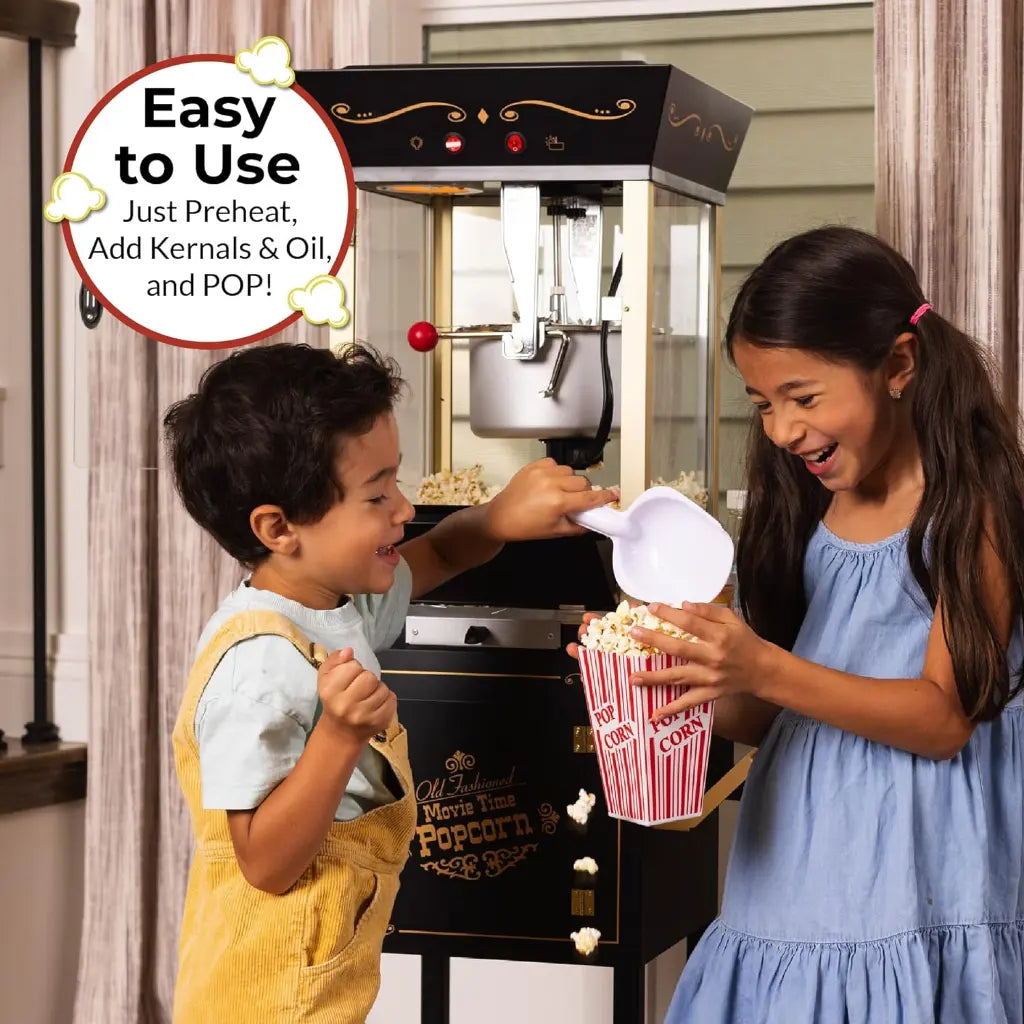 Two children using a home movie theater popcorn machine.
