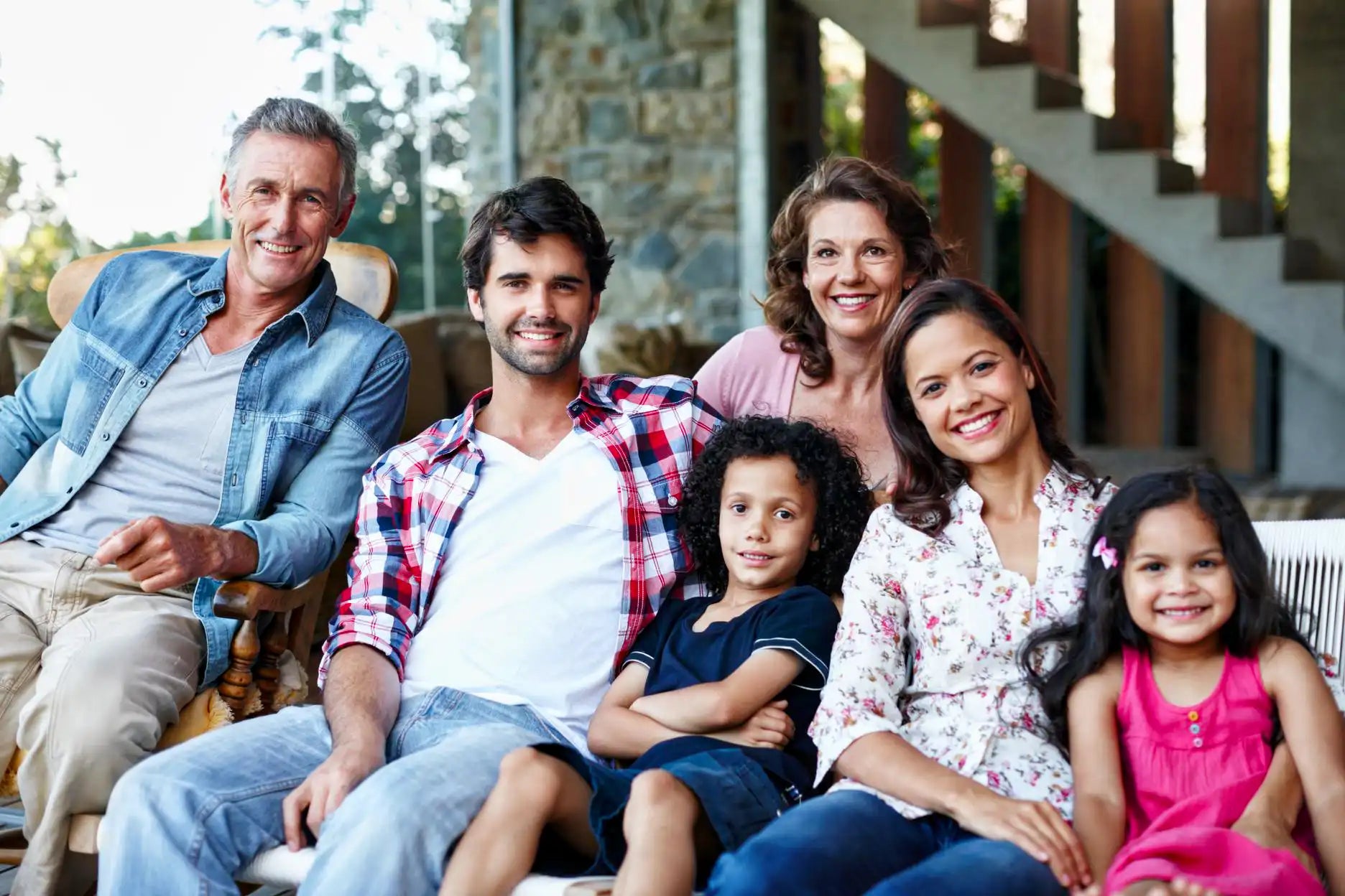 Smiling group at home used to represent the PopperLand team.