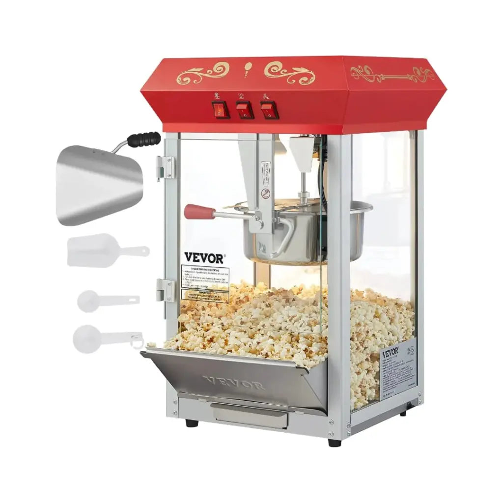 Theater popcorn machine with red top filled with popcorn and scoopers on the left.