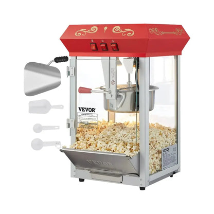 Theater popcorn machine with red top filled with popcorn and scoopers on the left.